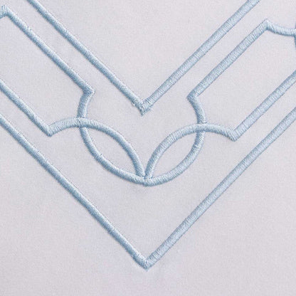 Close-up of Hamilton Light Blue Pillowcase on a light blue fabric