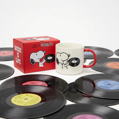 Shop Magpie Peanuts Mug: Snoopy with a vinyl record beside a red "Music Is Life" box. Perfect gift by Magpie Gifts.