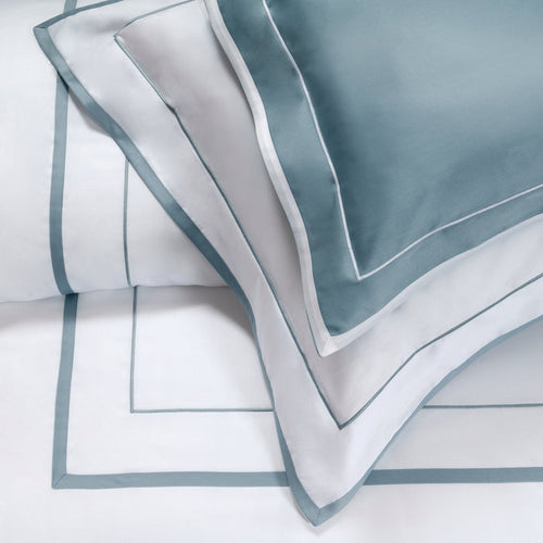 Mietta aquamarine and white pillowcase sham on a white background