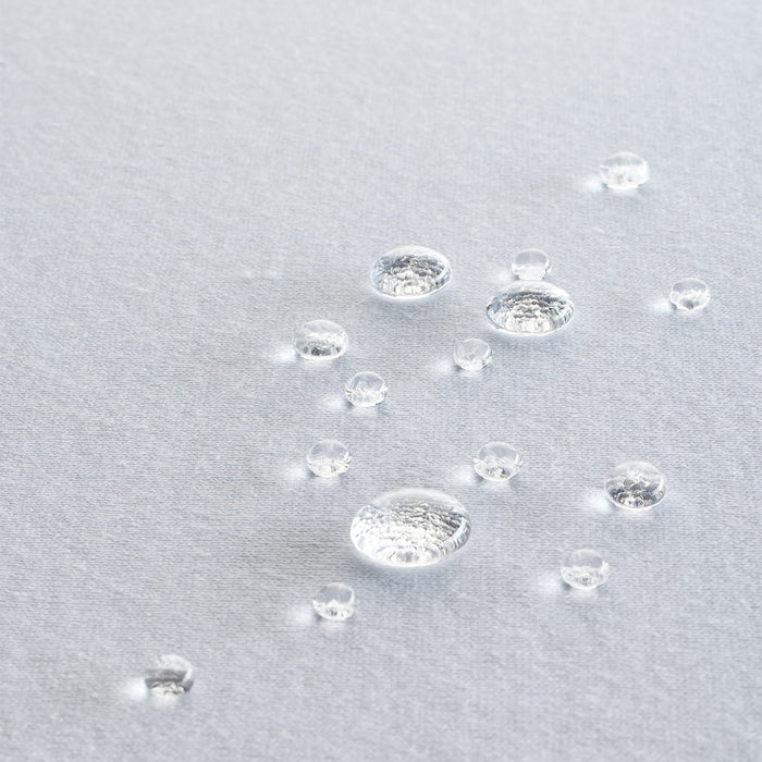 Nature Tencel Pillow Protector for tex blanca showing droplets of water on fabric