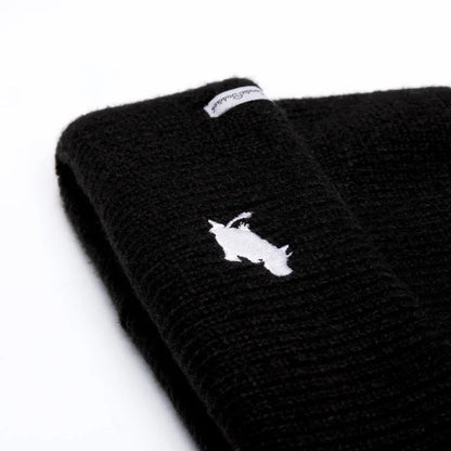 Shop Black Nordicbuddies Moomin beanie with white embroidered logo and fabric tag, top trendy winter hat accessory.