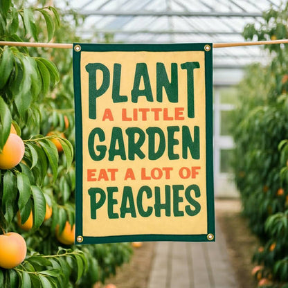 Oxford Pennant John Prine banner says, “Plant A Little Garden, Eat A Lot Of Peaches” with peach trees on both sides.