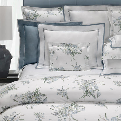 Profumi pillowcase sham and duvet cover on a bed.