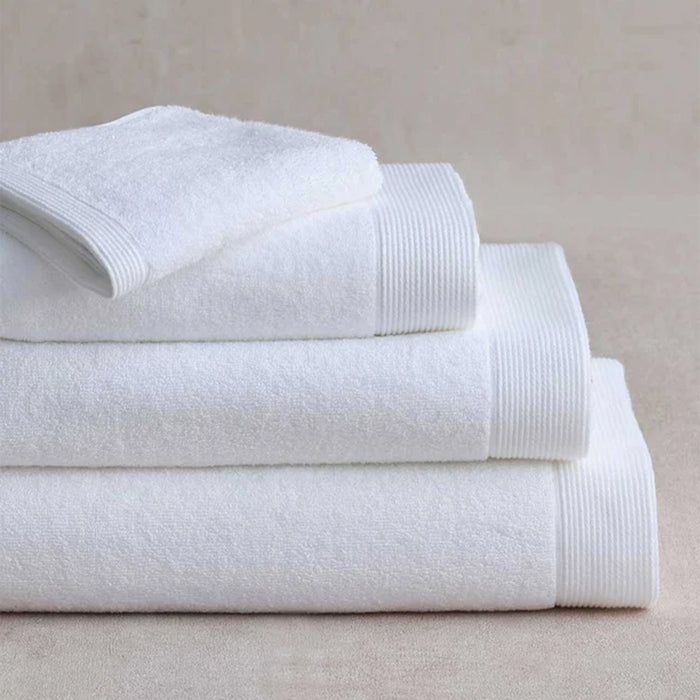 Stack of Renew Towel White on a neutral background