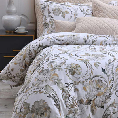 Ruben Duvet Cover Set on a bed with a nightstand in the background.