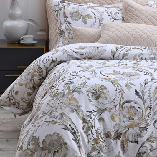 Ruben Duvet Cover Set on a bed with a nightstand in the background.