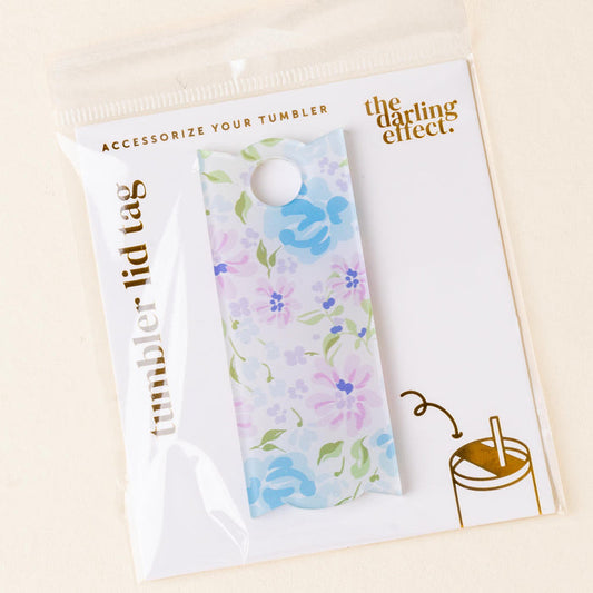 Secret Garden Blue Tumbler Lid Tag by the-darling-effect, in packaging. Text reads "Accessorize Your Tumbler" and "the darling effect." Add charm to your drinkware with this cute acrylic accessory.