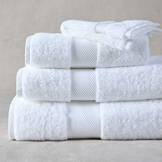Stack of Signature Towels White on a neutral background
