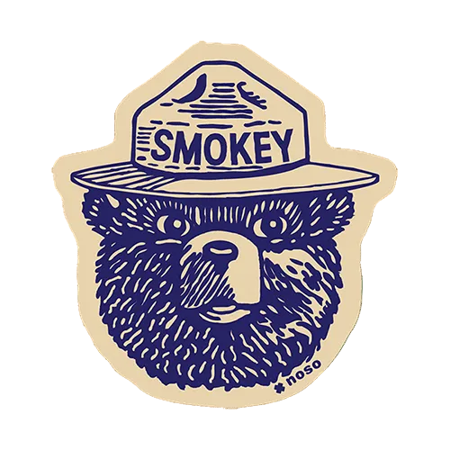 Forager Provisions LTD Smokey Bear vintage logo peel-and-stick repair patch for outdoor gear in navy and beige.