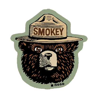 Forager Provisions LTD Smokey Bear retro logo peel-and-stick repair patch for outdoor gear on a sage green background.