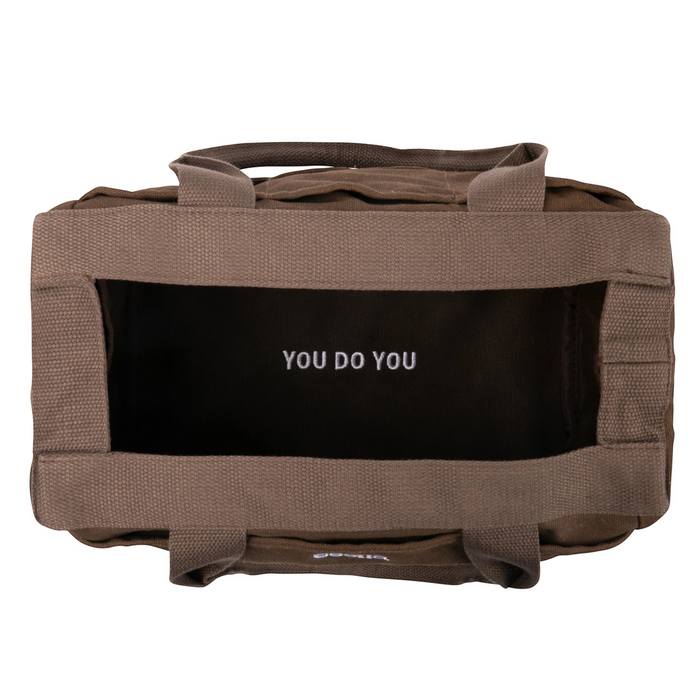Top view of Soolla Studio Pottery Artist Bag in Coffee Bean, empty, with YOU DO YOU quote at bottom. Soolla branding.