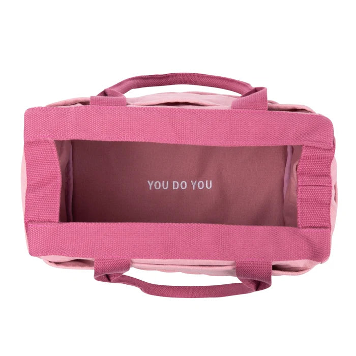 Soolla Studio Pottery Artist Bag in Desert Rose Pink with “YOU DO YOU” lining, perfect for organizing art supplies.