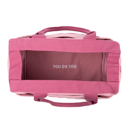 Soolla Studio Pottery Artist Bag in Desert Rose Pink with “YOU DO YOU” lining, perfect for organizing art supplies.