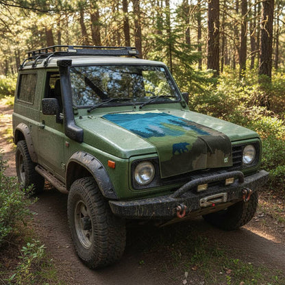 Forager Provisions LTD Sprints Grizzly Guide car seat cover towel featuring a mountain and bear print on a green 4x4