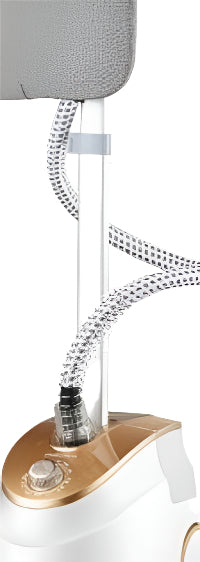 White iron with a flexible hose attachment on a gray background
