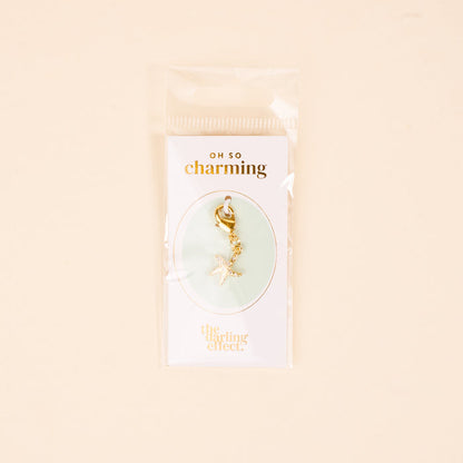 The Darling Effect’s Starfish Jewelry Charm Gold features sparkling rhinestones and a clasp, perfect for adding to your jewelry charm collection or charm bar.