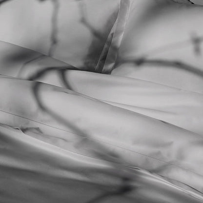 Close-up of Suave-CoolGrey pillowcase and duvet cover with folds and shadows