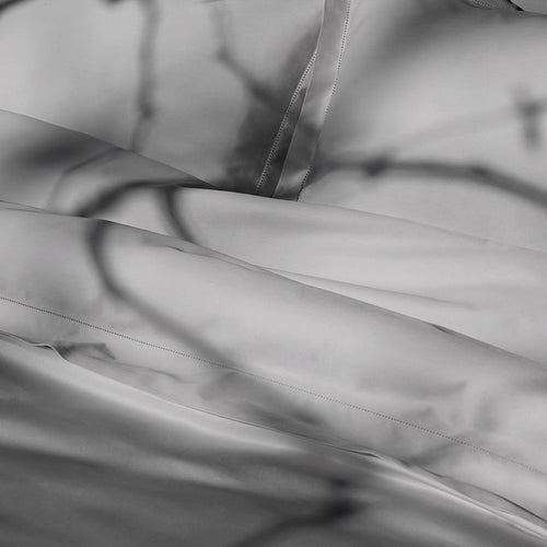 Close-up of Suave-CoolGrey pillowcase and duvet cover with folds and shadows