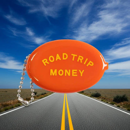 Forager Provisions LTD Three Potato Four orange vinyl coin pouch with Road Trip Money text on a highway background.