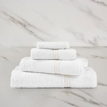 Triplo Bourdon Guest Towel on a marble surface