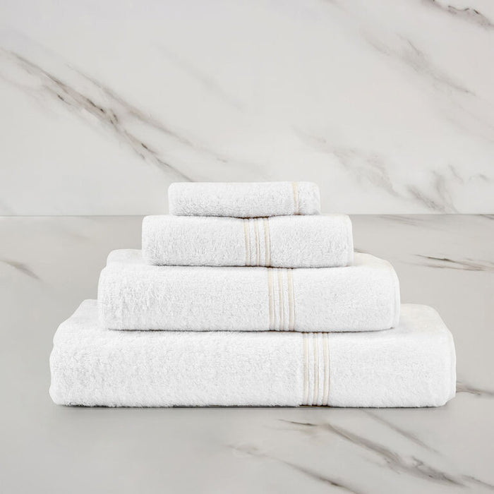 Triplo Bourdon Guest Towel on a marble surface