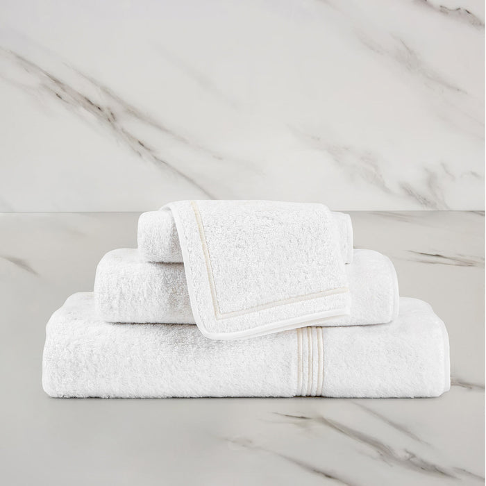 Triplo Bourdon Wash Cloth on a marble surface