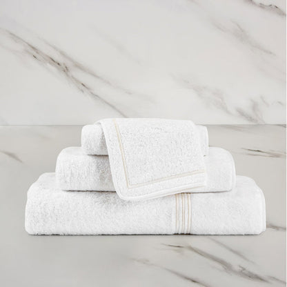 Triplo Bourdon Wash Cloth on a marble surface
