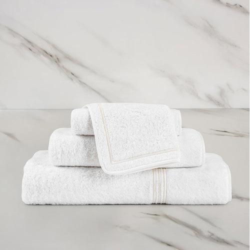 Triplo Bourdon Wash Cloth on a marble surface