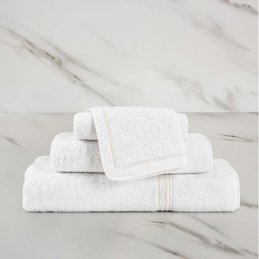 Triplo Bourdon Wash Cloth on a marble surface