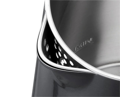 Close-up of a metallic object with 'AMIN' branding on a dark background