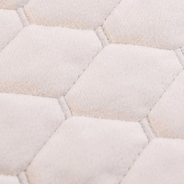 Close-up of a quilted fabric of Turner Latte Pillows and Cushions