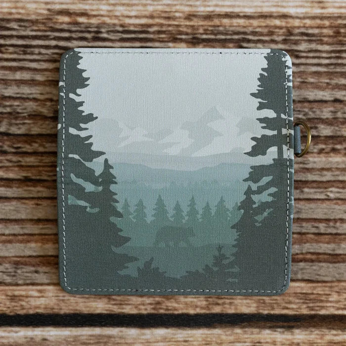 Wildtree Forest Friend SD/Switch Card Holder—forest silhouette wallet on wood background, perfect gaming accessory storage.