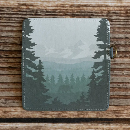 Wildtree Forest Friend SD/Switch Card Holder—forest silhouette wallet on wood background, perfect gaming accessory storage.