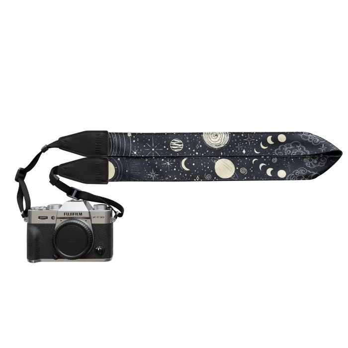 Forager Provisions LTD Wildtree camera strap featuring a celestial sun and moon pattern on a black polyester background.