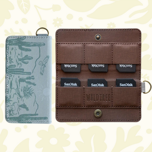 Forager Provisions LTD Wildtree card holder with western landscape print, brown interior, and SD card slots.