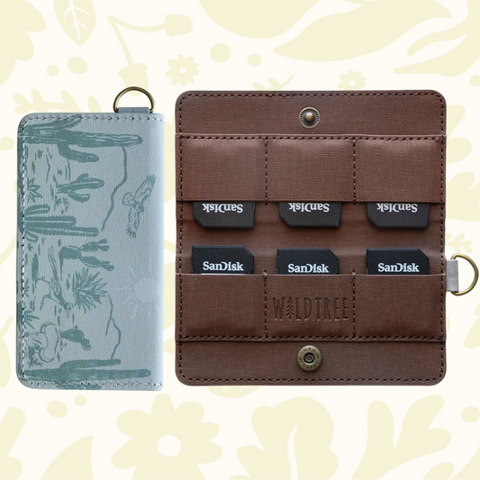 Forager Provisions LTD Wildtree card holder with western landscape print, brown interior, and SD card slots.